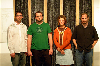 Mercer 7598 (L-R) UCR MFA grads Matthew Bryant, Jason Lutz, and Cheryl Gilge, posing with Sweeney Art Gallery's Shane Shukis, in front of Gilge's