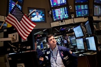 Mercer 19851 Traders at the New York Stock Exchange keep a close eye on the debt crisis talks, as The Dow continued a week-long decline.