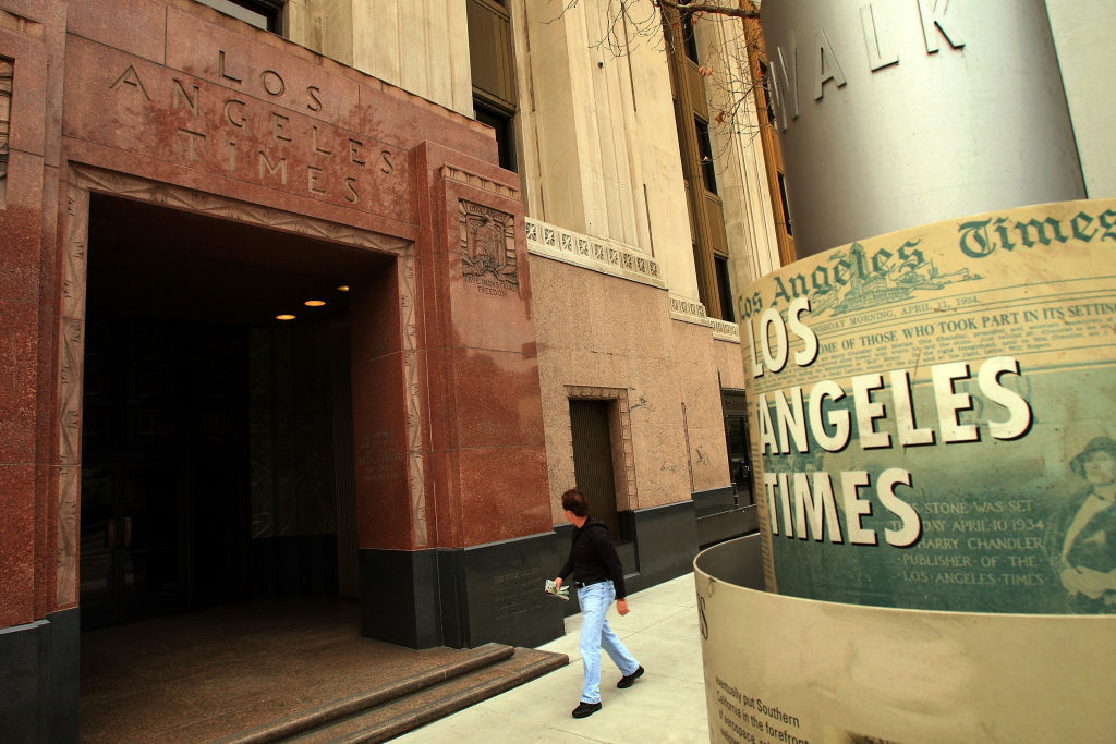 Tribune Co. Prepares For Possible Bankruptcy Filing The Los Angeles Times newspaper building is seen as its parent Tribune Company files for bankruptcy-court protection, December 8, 2008 in Los Angeles, California. The Tribune Company, which owns the LA Times, Chicago Tribune, other newspapers, television stations, the Chicago Cubs and Wrigley Field, is $13 billion in debt. Most of its debt comes from a complex transaction last year by real estate mogul Sam Zell to make the company private. Since then, the recession, increasing online readership, and severe reductions in advertising have pushed the company deeper into financial instability.