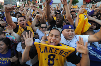 Los Angeles Lakers fans celebrate outside the Staples Center in Los Angeles after their team defeated the Orlando Magic in the NBA final on June 14, 2009. The Lakers won the series 4-1