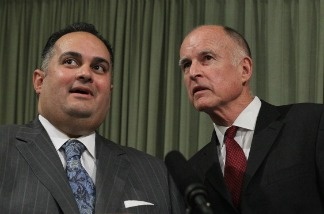 Mercer 15687 What's that off in the distance? A budget deal? California Governor Jerry Brown (R) looks on with Speaker of the Assembly John Perez (L).
