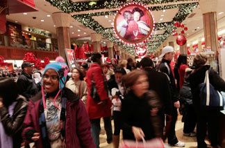 Shoppers move about in Macy's department store in Midtown Manhattan November 26, 2010 in New York City.