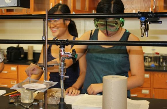 Slaughterhouse Series Binh Hua (left) and My Nguyen, both 18, work in the Garden City Community College chemistry lab. The two best friends graduated from high school in three years and after community college, plan to go on to universities.