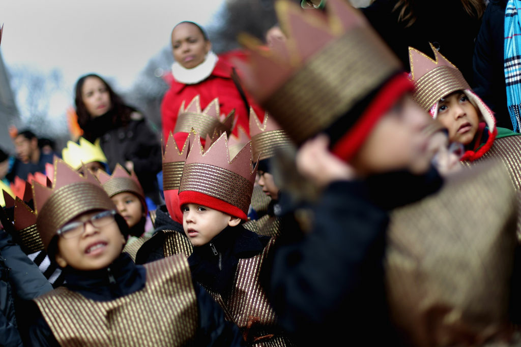 Three Kings Parade Held In New York Children are dressed as kings in the Three Kings Day Parade in East Harlem on January 6, 2012 in New York City. The parade celebrates the Feast of the Epiphany, also known as Three Kings Day, marking the Biblical story of the visit of three kings to Bethlehem to visit the baby Jesus, revealing his divinity.