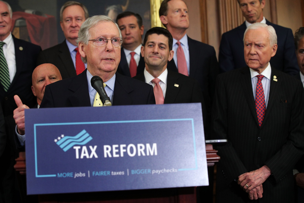 House And Senate Republican Leaders Release Tax Reform Plan WASHINGTON, DC - SEPTEMBER 27: U.S. Senate Majority Leader Sen. Mitch McConnell (R-KY) speaks as Speaker of the House Rep. Paul Ryan (R-WI), Sen. Orrin Hatch (R-UT) and other congressional Republicans listen during a press event on tax reform September 27, 2017 at the Capitol in Washington, DC. On Wednesday, Republican leaders proposed cutting tax rates for the middle class, wealthy and businesses. Key questions remain on how they plan to offset the trillions of dollars in lost tax revenue. (Photo by Alex Wong/Getty Images)