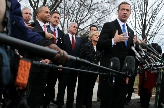 Governor Martin O'Malley of Maryland (center) speaks as other Democratic governors look on during a press briefing after a meeting with President Barack Obama on Feb. 25, 2011 in Washington, DC.