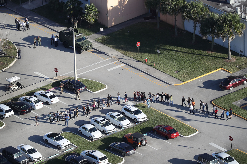 Shooting At High School In Parkland, Florida Injures Multiple People People are brought out of the Marjory Stoneman Douglas High School after a shooting at the school that reportedly killed and injured multiple people on February 14, 2018 in Parkland, Florida. Numerous law enforcement officials continue to investigate the scene.