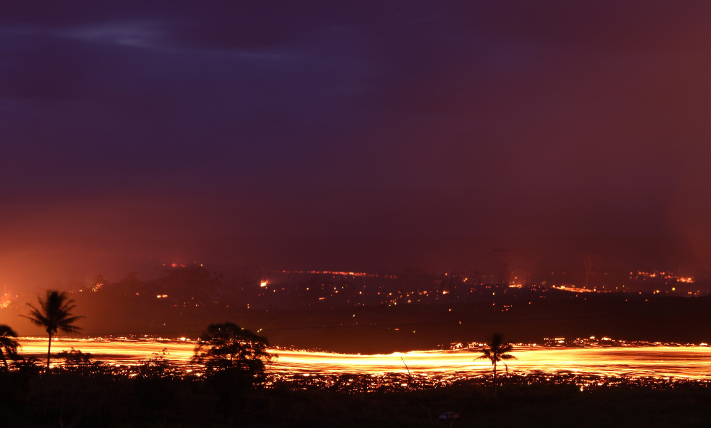 Hawaii's Kilauea Volcano Erupts Forcing Evacuations A lava flow from a Kilauea volcano advances on Hawaii's Big Island on May 19, 2018 in Kapoho, Hawaii.