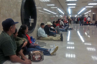 Farm workers await California Governor Jerry Brown's decision on card check. The governor vetoed it shortly before midnight, June 28, 2011.