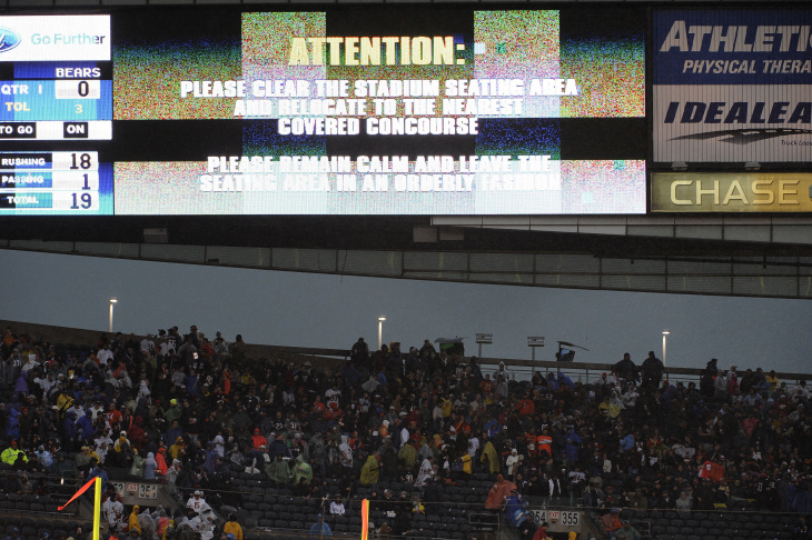 A firefighter searches through debris after a tornado struck on November 17, 2013 in Washington, Illinois. Several tornadoes touched down across the Midwest today with at least three people reported dead in Illinois. 