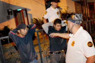 Undocumented immigrants are detained by U.S. Customs and Border Protection bike patrol agents after entering the country illegally June 2, 2010 in Nogales, Arizona.