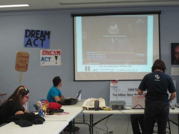 Students at a makeshift call center downtown watch C-SPAN as they make final calls to legislators urging support for the Dream Act, December 8, 2010
