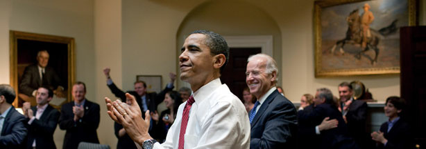 President Barack Obama, Vice President Joe Biden and senior staff applaud in the Roosevelt Room of the White House as the U.S. House of Representatives passed the health care reform legislation Sunday, March 21.