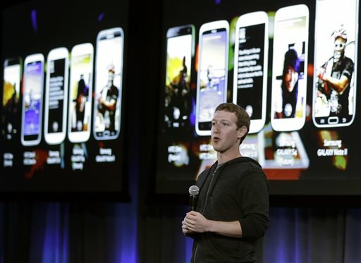 Facebook CEO Mark Zuckerberg speaks at the company's headquarters in Menlo Park, Calif., Thursday, April 4, 2013. Zuckerberg says the company is not building a phone or an operating system. Rather, Facebook is introducing a new experience for Android phones. The idea behind the new Home service is to bring content right to you, rather than require people to check apps on the device.