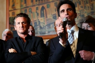 Academy award winning actor Sean Penn (left) looks on as California Sen. Mark Leno (right) speaks during a press conference announcing legislation to create a Harvey Milk Day in California on March 3, 2009 in San Francisco to recognize the efforts of the slain gay rights activist.