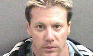 Booking photo of Derrick Frisco taken July 23, 2010 courtesy of the Orange County Sheriff's Department