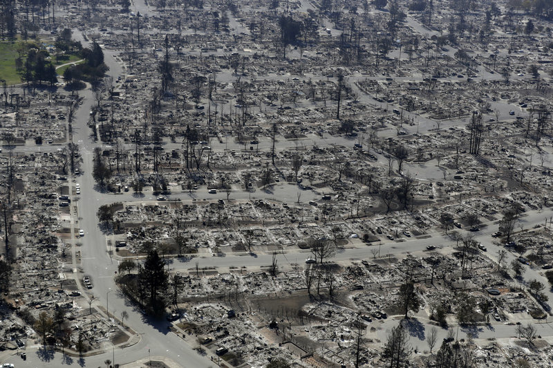 ap_17314069245602_custom-afb14e1e769bffe5e227a5ad4e4721cb606e5952-s800-c85.jpg An aerial view shows the devastation of the Coffey Park neighborhood in Santa Rosa after a wildfire swept through.