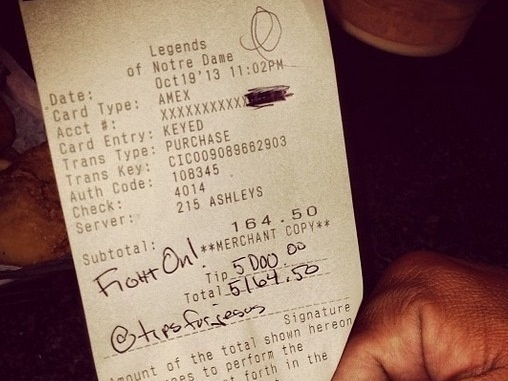 One of the two checks that "TipsForJesus" signed at a restaurant in South Bend, Ind., on Oct. 19. The anonymous givers added $5,000 to each of the bills.