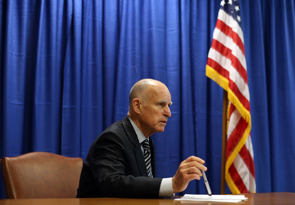 Governor Brown Signs California Homeowner Bill Of Rights SAN FRANCISCO, CA - JULY 11: California Governor Jerry Brown prepares to sign copies of the California Homeowner Bill of Rights (AB 278 and SB 900) on July 11, 2012 in San Francisco, California. Gov. Jerry Brown signed the California Homeowners Bill of Rights that establishes landmark protection rules for mortgage loan borrowers. The laws go into effect on January 1, 2013. (Photo by Justin Sullivan/Getty Images)