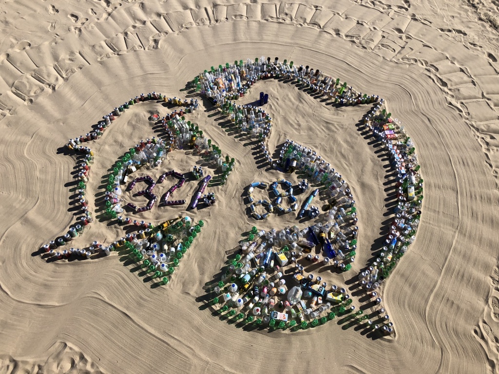 One person's annual drink container usage makes up this pie chart. The smaller dolphin represents the 32 percent of bottles, cans and cartons that are recycled. The other 68 percent is thrown away. One person's annual drink container usage makes up this pie chart. The smaller dolphin represents the 32 percent of bottles, cans and cartons that are recycled. The other 68 percent is thrown away.