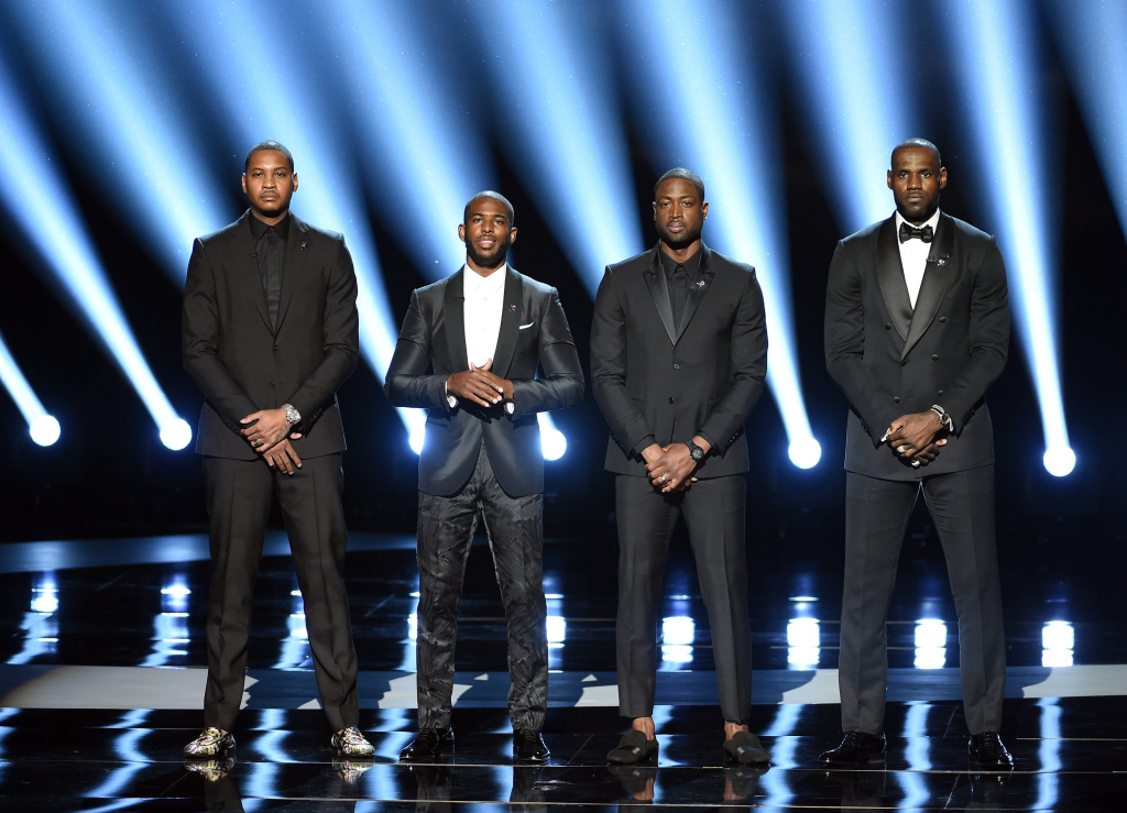 The 2016 ESPYS - Show LOS ANGELES, CA - JULY 13: (L-R) NBA players Carmelo Anthony, Chris Paul, Dwyane Wade and LeBron James speak onstage during the 2016 ESPYS at Microsoft Theater on July 13, 2016 in Los Angeles, California. (Photo by Kevin Winter/Getty Images)