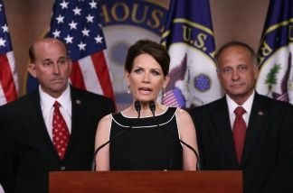 Mercer 19441 U.S. Rep. Louie Gohmert (R-TX), (L) and U.S. Rep. Steve King (R-IA) (R) look on as Republican presidential candidate and U.S. Rep. Michele Bachmann (R-MN) speaks at a news conference at the U.S. Capitol July 13, 2011 in Washington, DC. Gohmert, Bachmann and King spoke on legislation regarding the debt ceiling and military benefits.