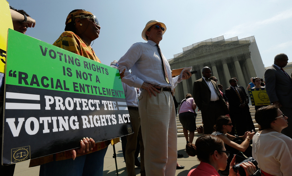 Supreme Court Issues Orders On Pending Cases Supporters of the Voting Rights Act listen to speakers discussing today's rulings outside the U.S. Supreme Court building on June 25, 2013 in Washington, DC. The court ruled that Section 4 of the Voting Rights Act, which aimed at protecting minority voters, is unconstitutional. The high court convened again today to rule on some high profile decisions including two on gay marriage and one on voting rights.