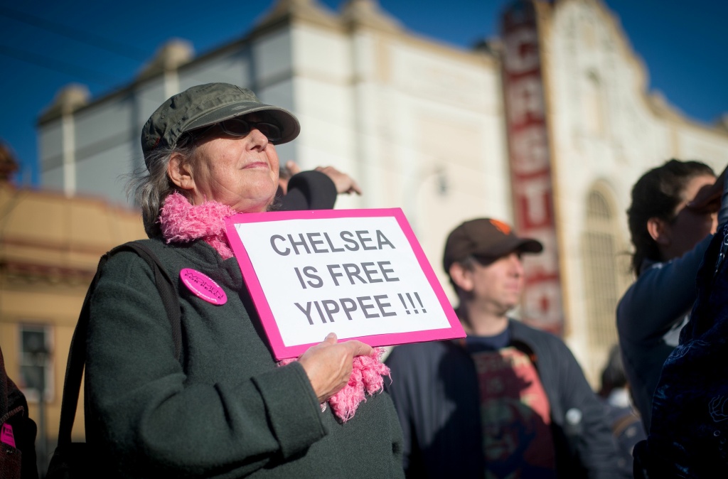 US-MILITARY-INTELLIGENCE-MANNING Renay Davis holds up a sign showing support for Chelsea Manning in the Castro District of San Francisco, California on May 17, 2017, during a celebration for Manning's release.