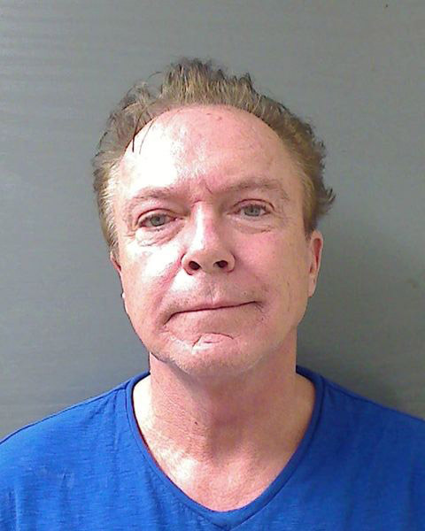 File: In this handout photo provided by the Schodack Police Department, David Cassidy is seen in a police booking photo after his arrest on charges of felony DWI, driving while intoxicated, Aug. 21, 2013 in Schodack, New York.