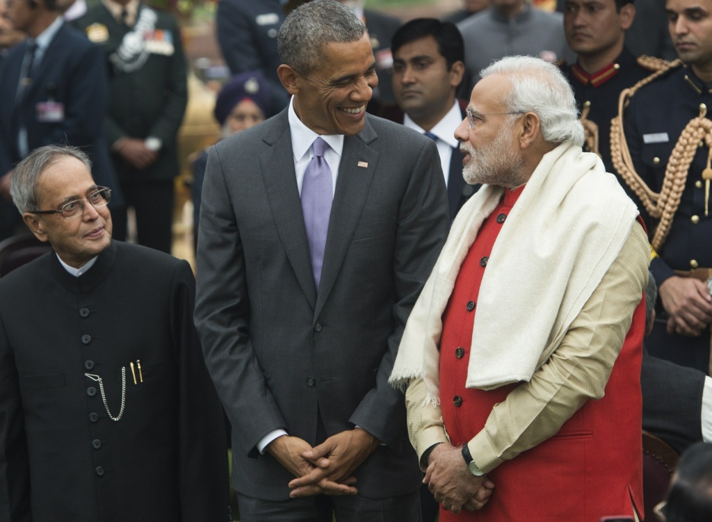 INDIA-US-DIPLOMACY US President Barack Obama (C), Indian Prime Minister Narendra Modi (R) and Indian President Pranab Mukherjee (L) attend a reception at Rashtrapati Bhawan, the Presidential Palace, in New Delhi on January 26, 2015. AFP PHOTO / SAUL LOEB (Photo credit should read SAUL LOEB/AFP/Getty Images)