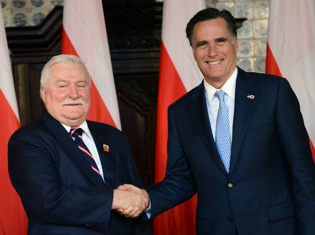 Republican presidential candidate and fo Republican presidential candidate and former Governor of Massachusetts Mitt Romney (R) shakes the hand of former Polish President and Nobel Peace Prize winner Lech Walesa, during a meeting at Artus Court, in Gdansk, on 30, 2012. White House hopeful Mitt Romney is to hold talks with Poland's Prime Minister Donald Tusk and the anti-communist icon Lech Walesa, as he makes his first venture beyond the old iron curtain. On the final leg of a three-stop tour designed to burnish his foreign policy credentials, the Republican contender has chosen to visit a country which has notably testy relations with Russia and is now a key pillar of NATO and the EU.