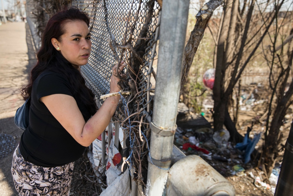 US-HEROIN-CRISIS-OPIOID-CRIME Jessica, a homeless addict, looks down at the heroin encampment where she typically lives in the Kensington neighborhood of Philadelphia, Pennsylvania, on April 10, 2017.