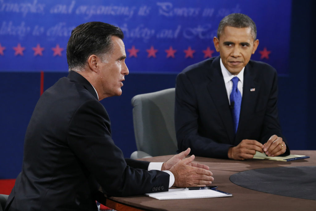 Obama And Romney Spar In Final Debate Before Presidential Election U.S. President Barack Obama (R) debates with Republican presidential candidate Mitt Romney at the Keith C. and Elaine Johnson Wold Performing Arts Center at Lynn University on October 22, 2012 in Boca Raton, Florida. The focus for the final presidential debate before Election Day on November 6 is foreign policy.
