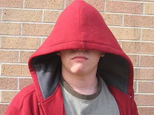 Hoodie Someone sporting a large hoodie.