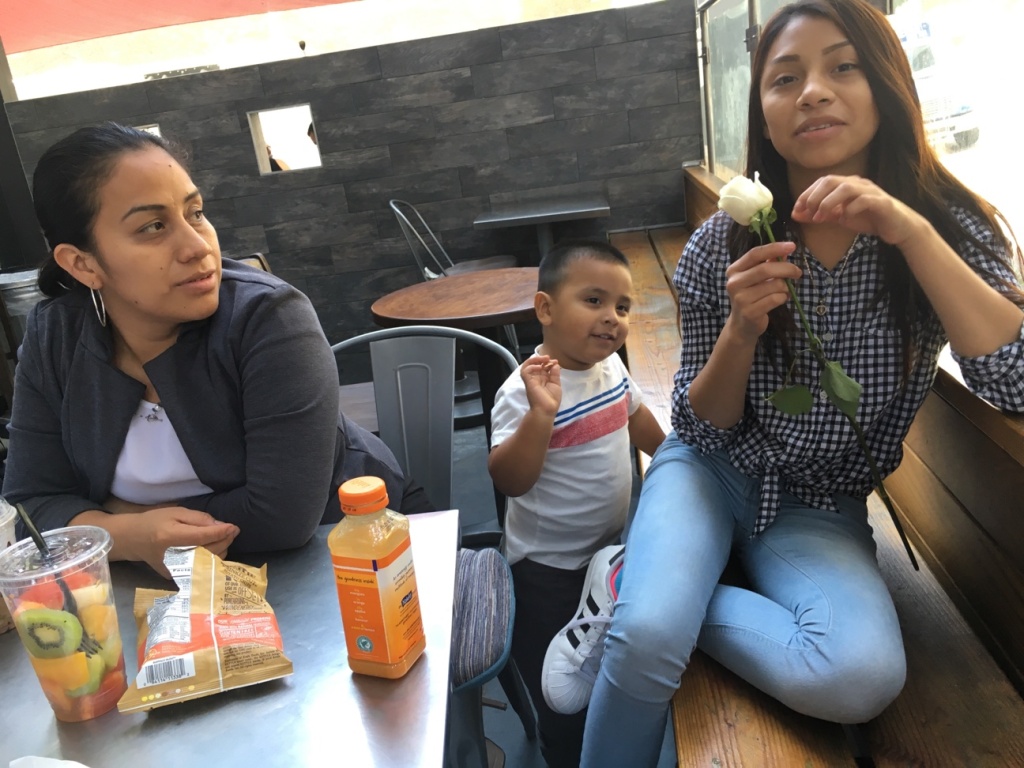 After Asylum Ana Hernández looks on as her daughter, Michell, takes a break after her visit to the immigration court in Los Angeles.