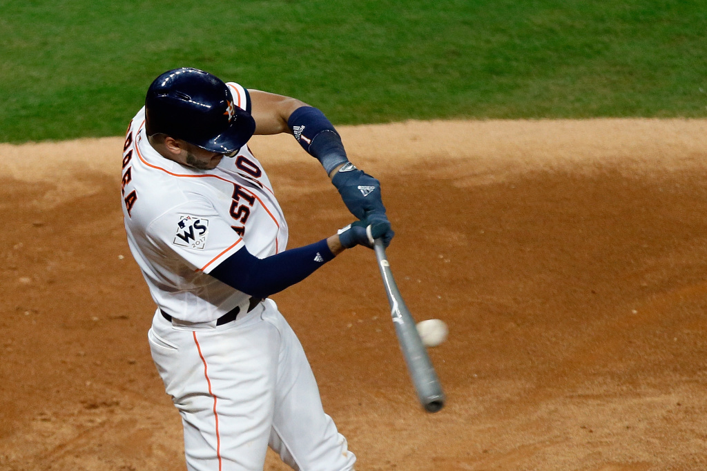World Series - Los Angeles Dodgers v Houston Astros - Game Three HOUSTON, TX - OCTOBER 27: Carlos Correa #1 of the Houston Astros hits a single during the eighth inning against the Los Angeles Dodgers in game three of the 2017 World Series at Minute Maid Park on October 27, 2017 in Houston, Texas. (Photo by Bob Levey/Getty Images)