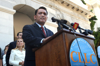 State Sen. Gil Cedillo, D-Los Angeles, calls on lawmakers to approve his proposed resolution calling on California to begin an economic boycott of Arizona over its controversial immigration law, at the Capitol in Sacramento, Calif., Wednesday, June 23, 2010.