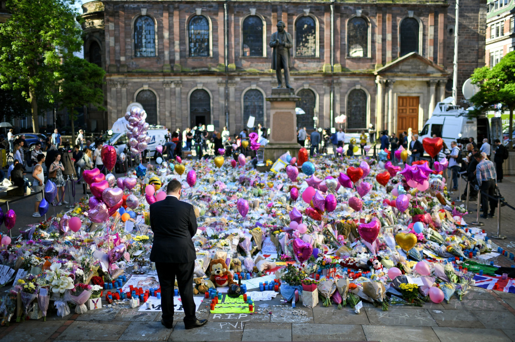 Manchester terrorist attack Flowers and tributes were left in Manchester's St. Ann's Square honoring the memories of those who died in May's terrorist attack at the Manchester Arena.
