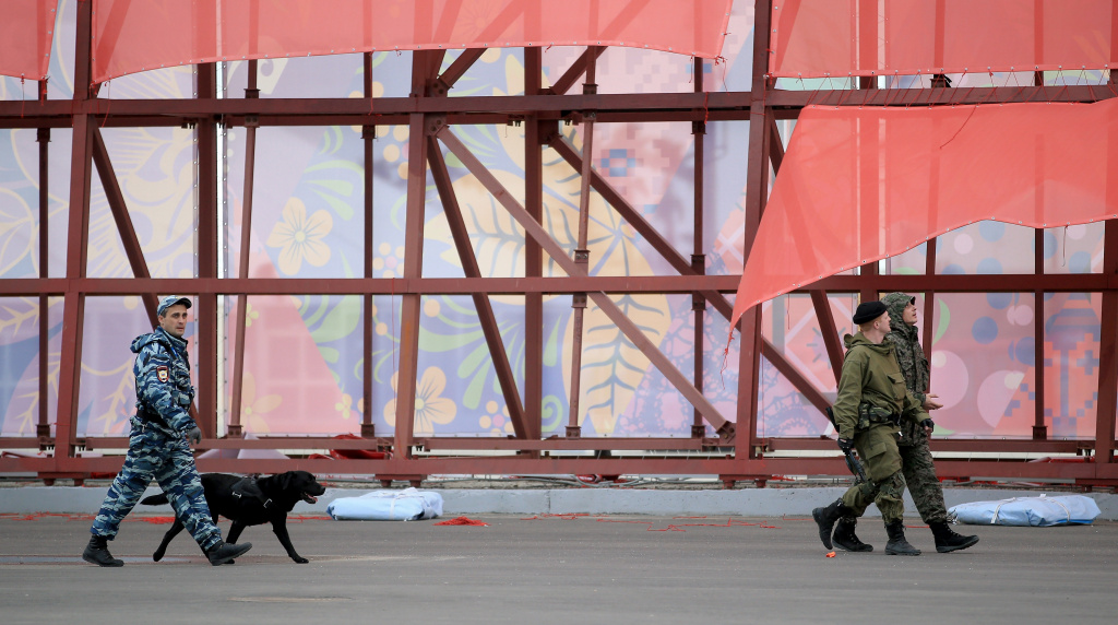 Views Of Sochi Ahead Olympic Games Security with dogs patrol around the Sochi 2014 Winter Olympic Park in the Costal Cluster on January 28, 2014 in Sochi, Russia.