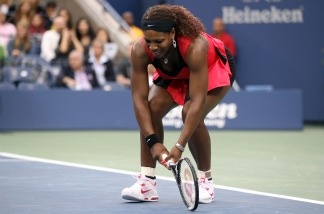 Serena Williams of the United States reacts while playing against Samantha Stosur of Australia during the Women's Singles Final on Day Fourteen of the 2011 US Open.