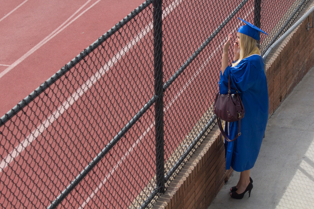 Santa Monica College Graduation A student waves to her friend at the Santa Monica College graduation on June 11th, 2013.