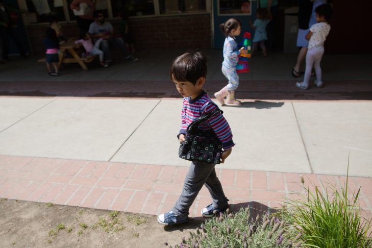 A preschool student at La Canada's Child Educational Center plays with mud. Jordan Young, a neuroscientist,  emphasizes that associations between gender and color, or gender and specific activities aren’t hardwired in the baby’s brain – the physical and social environment we give to kids builds them up