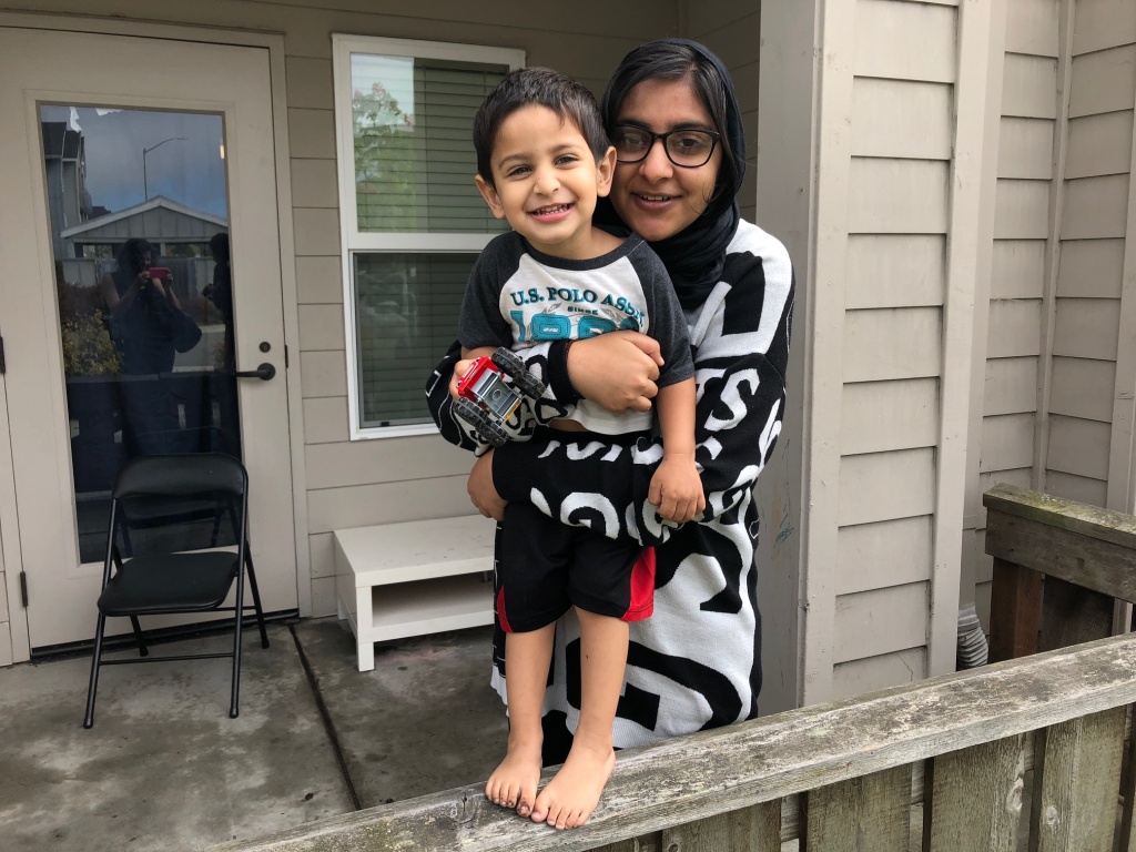 Sadia Kahn with her son Hashim outside their new apartment in University Village.
Sadia Kahn with her son Hashim outside their new apartment in University Village.