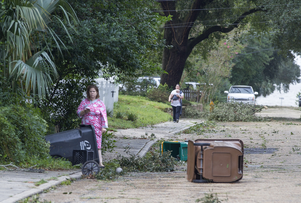 Hurricane Nate Slams Into U.S. Gulf Coast Residents of Biloxi, Mississippi venture out just after dawn on Sunday, October 8, 2017 to survey the damage after Hurricane Nate made landfall in the region.