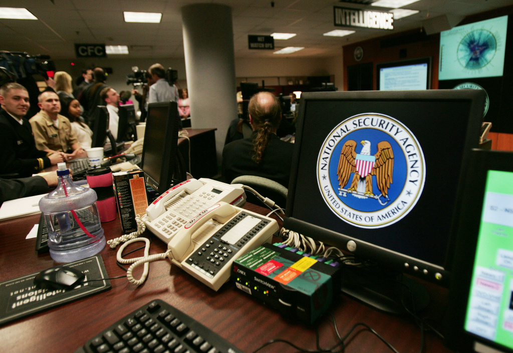 A computer workstation bears the Nationa File: A computer workstation bears the National Security Agency (NSA) logo inside the Threat Operations Center inside the Washington suburb of Fort Meade, Maryland, intelligence gathering operation Jan. 25, 2006.