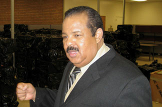Photo of Avery Clayton during a tour of the site of the Mayme Clayton Library and Museum.