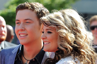 Finalists Scotty McCreery (L) and Lauren Alaina arrive at Fox's 'American Idol' season 10 finale results show held at Nokia Theatre LA Live on May 25, 2011 in Los Angeles, California.