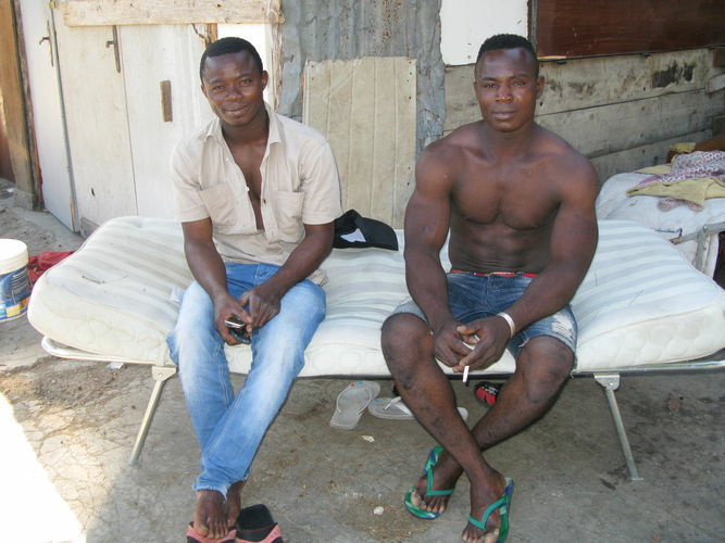 African migrants fired from Italian factories in the north have joined the swelling ranks of people searching for agriculture work in the south. Originally from Burkina Faso, Karim Suruku (right) is a migrant worker in Calabria in southern Italy. At left is Amidou Denamidou.