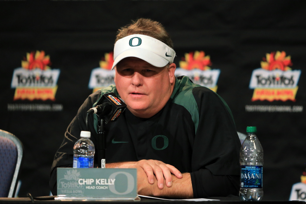 Tostitos Fiesta Bowl - Oregon v Kansas State Head coach Chip Kelly of the Oregon Ducks participates in a post-game press conference after they defeated the Kansas State Wildcats the Tostitos Fiesta Bowl on January 3, 2013.