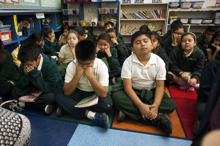Training in self control starts early at Camino Nuevo. Karina Rodriguez leads preschoolers through a motor skills exercise, asking them to start and stop based on musical cues. Students will be exposed to 14 years of curriculum designed to address academic and soft skills.